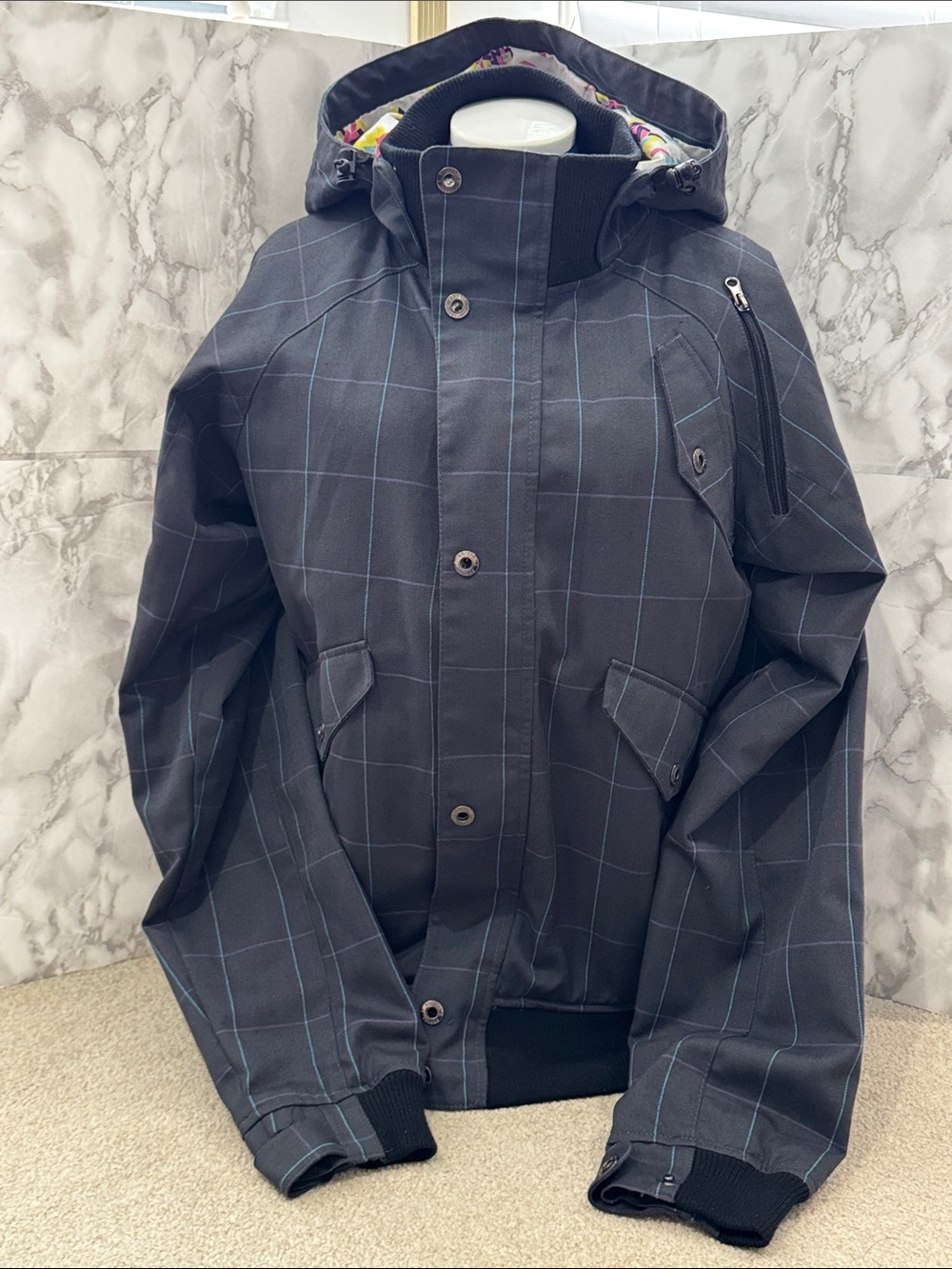 Empyre Women’s light layering jacket, utility may be with all the pockets. LOTS.